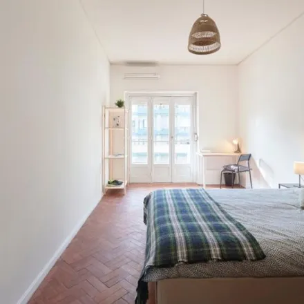 Rent this 6 bed room on Rua Tristão Vaz 8 in 1400-191 Lisbon, Portugal
