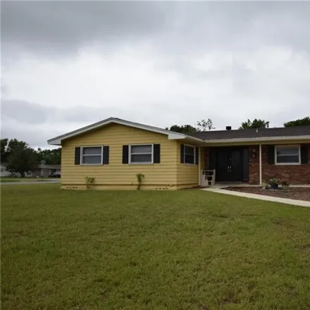 Rent this 4 bed house on 1931 English Drive in Deltona, FL 32738