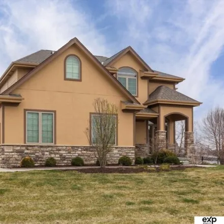 Buy this 5 bed house on 8299 Swallowtail Street in Sarpy County, NE 68046