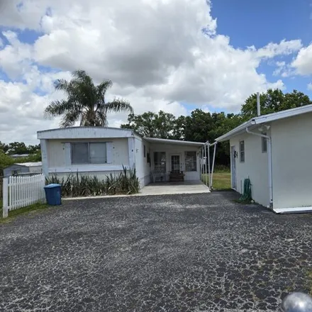 Buy this 2 bed house on 4091 Southeast 28th Street in Taylor Creek, Okeechobee County