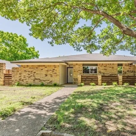 Buy this 5 bed house on 1924 Kensington Drive in Carrollton, TX 75007