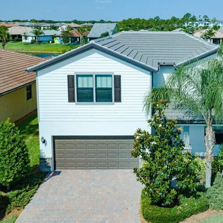 Buy this 4 bed house on 343 Se Courances Dr in Port Saint Lucie, Florida