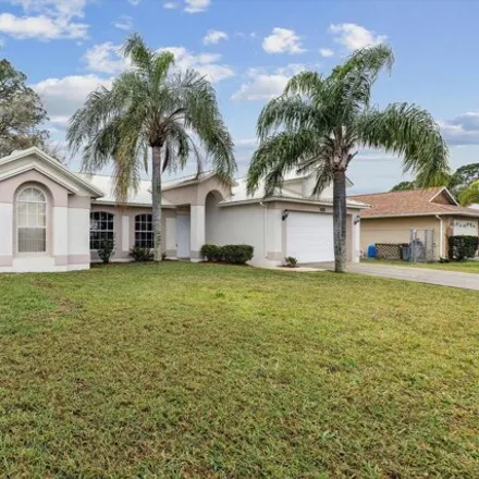 Buy this 3 bed house on 430 Delmonico Street Northeast in Palm Bay, FL 32907