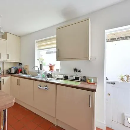 Rent this 2 bed townhouse on Strachan Place in London, SW19 4RH