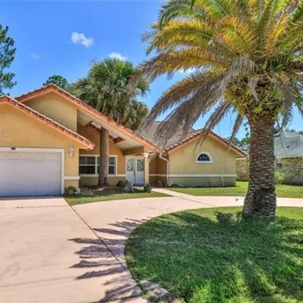 Buy this 4 bed house on 37 Baltimore Lane in Palm Coast, FL 32137
