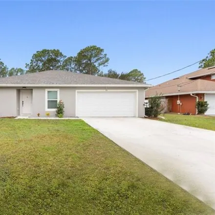 Buy this 3 bed house on 20 Seville Orange Path in Palm Coast, FL 32164