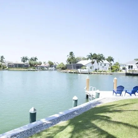 Buy this 4 bed house on Aruba Court in Marco Island, FL 34145