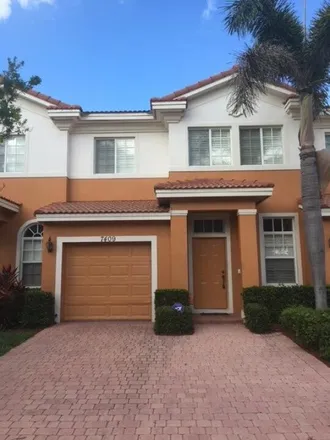 Rent this 3 bed townhouse on 7407 Briella Drive in Palm Beach County, FL 33437