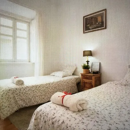 Rent this 4 bed room on Rua do Zaire 11 in 1170-397 Lisbon, Portugal