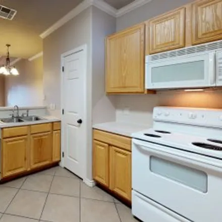 Rent this 4 bed apartment on 111 Kleine Lane in Edelweiss Gartens, College Station