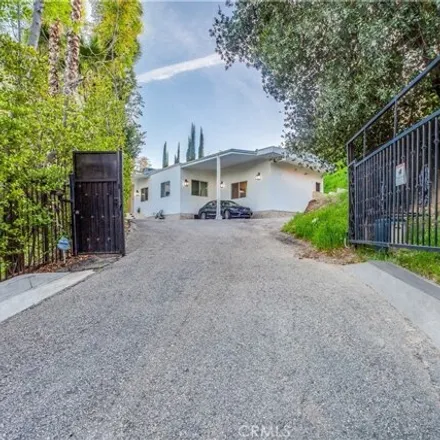 Rent this 4 bed house on 19600 Linnet Street in Los Angeles, CA 91356