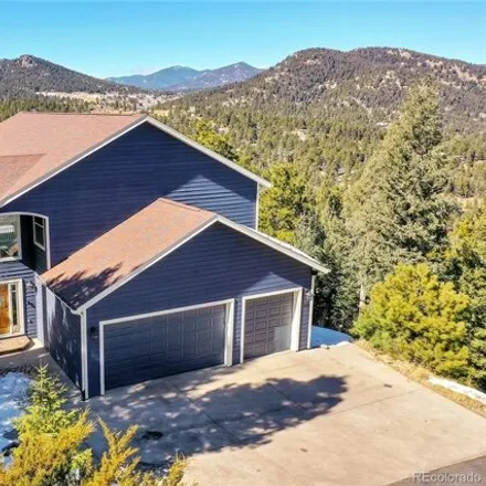 Buy this 4 bed house on 29599 Falcon Ridge Drive in Jefferson County, CO 80439