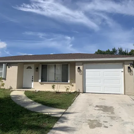 Rent this 3 bed house on 445 Southwest Tulip Boulevard in Port Saint Lucie, FL 34953