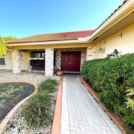 Buy this 4 bed house on 19474 Northwest 8th Street in Pembroke Pines, FL 33029