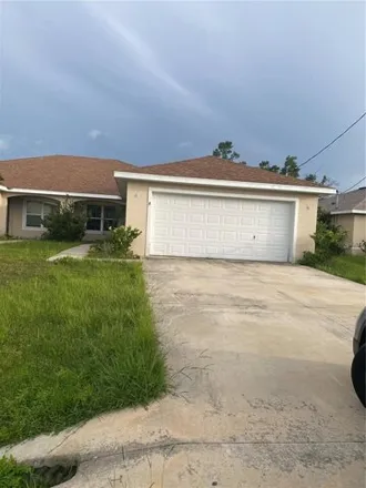 Rent this 4 bed house on 22 Wood Amber Lane in Palm Coast, FL 32164