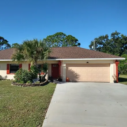 Buy this 3 bed house on 118 Olivick Circle Northeast in Palm Bay, FL 32907