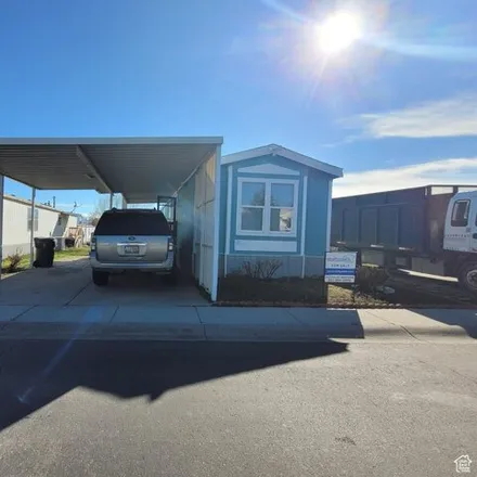 Buy this studio apartment on 5040 Kathan Way in Kearns, UT 84118