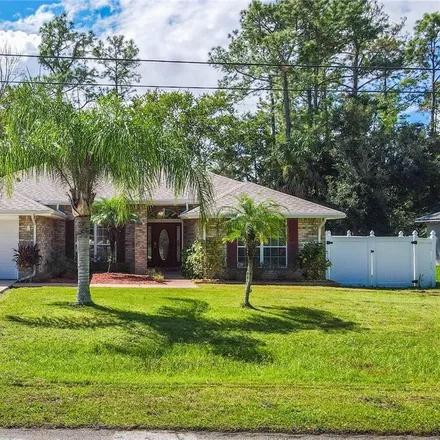 Buy this 4 bed house on 101 Boulder Rock Drive in Palm Coast, FL 32137