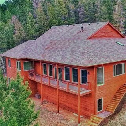 Buy this 5 bed house on Lori Drive in Jefferson County, CO 80441