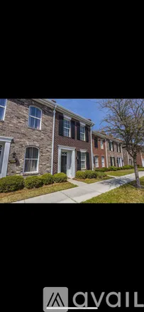 Rent this 2 bed townhouse on 3560 Alexandria Avenue