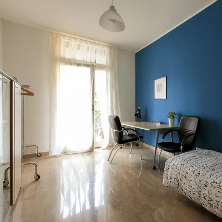 Rent this 3 bed room on Via Medardo Rosso in 11, 20159 Milan MI