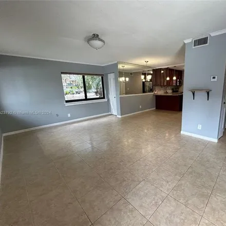 Rent this 2 bed condo on 230 Wimbledon Lakes Drive in Plantation, FL 33324