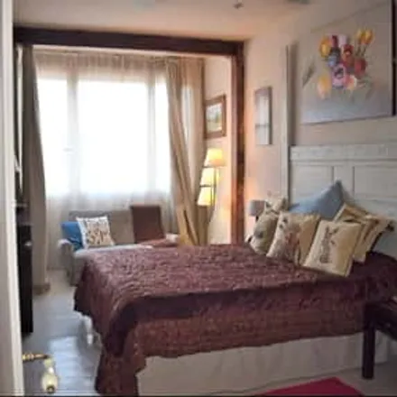 Rent this 4 bed room on Madrid in Calle de Alcalá, 202