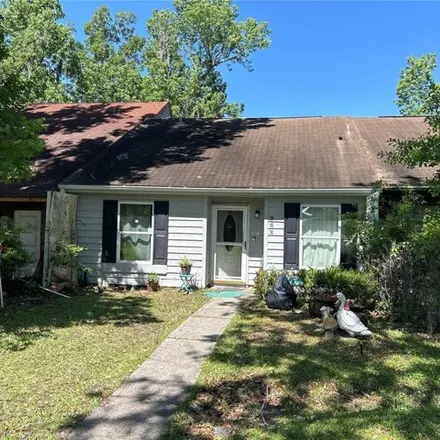 Buy this 2 bed house on 987 Village Drive in Brooksville, Hernando County
