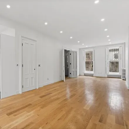Buy this 7 bed townhouse on 81 Monroe Street in New York, NY 11216