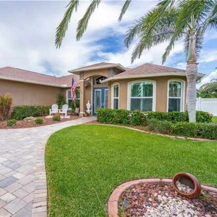 Buy this 3 bed house on 3505 Se 22nd Ave in Cape Coral, Florida