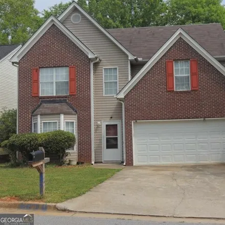 Rent this 4 bed house on 6566 Lake Mill Trace in Browns Mill Lake, Stonecrest