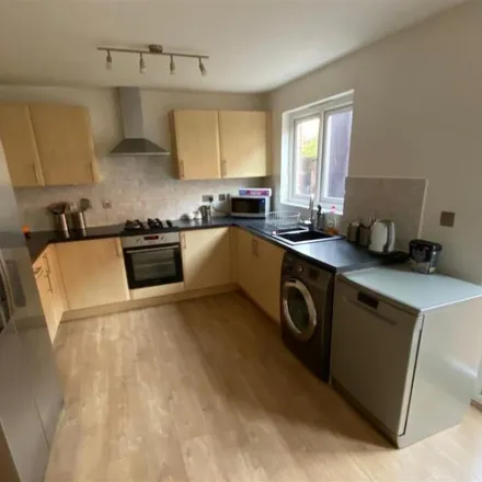 Rent this 4 bed townhouse on 34 Harnwood Square in Bristol, BS7 8QN
