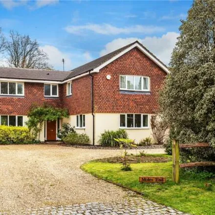 Buy this 4 bed house on Woodland Avenue in Cranleigh, GU6 7HZ