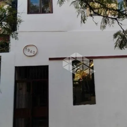 Buy this 4 bed house on Rua Santa Cecília in Rio Branco, Porto Alegre - RS