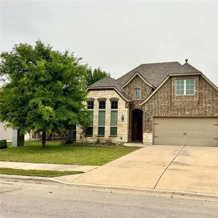 Rent this 3 bed house on 18005 Silent Harbor Loop in Travis County, TX 78660