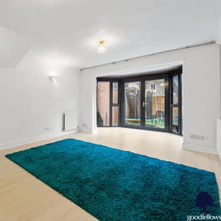 Rent this 3 bed house on 64 Henfield Road in London, SW19 3HH