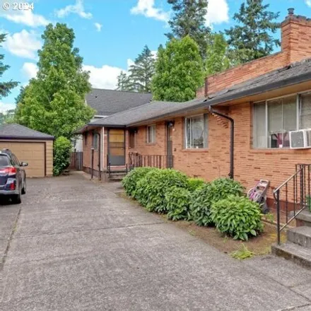 Buy this 8 bed house on 4210 NE 42nd Ave in Portland, Oregon