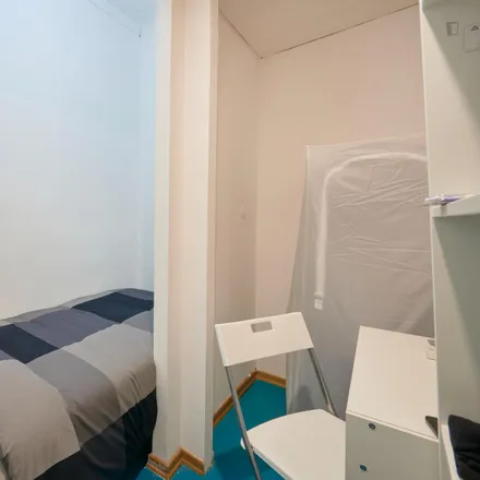 Rent this 21 bed room on Avenida António de Serpa in 1069-199 Lisbon, Portugal