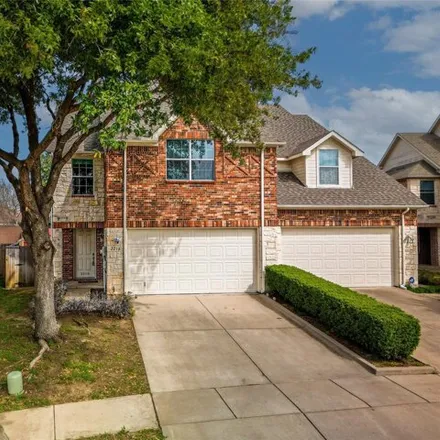 Buy this 4 bed townhouse on 2207 Ashwood Court in Carrollton, TX 75006