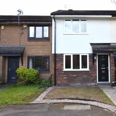 Rent this 2 bed townhouse on Watkins Drive in Bury, M25 0DS