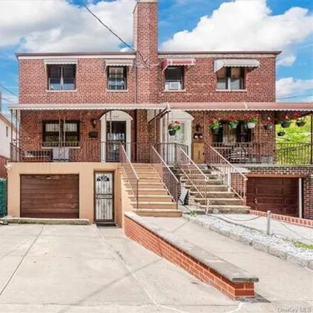 Buy this 5 bed house on 1665 Tomlinson Avenue in New York, NY 10461