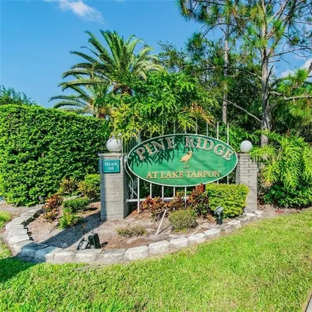 Buy this 2 bed condo on 3100 Lake Pine Way in East Lake, FL 34688