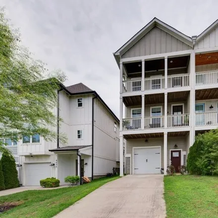 Rent this 4 bed house on 4604 Michigan Ave Unit B in Nashville, Tennessee