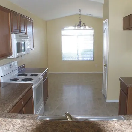 Rent this 3 bed apartment on 398 North 21st Circle in Coolidge, Pinal County