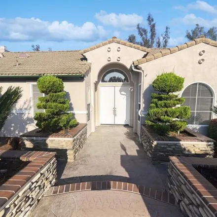 Buy this 4 bed house on 2071 Hallmark Pl in Escondido, California