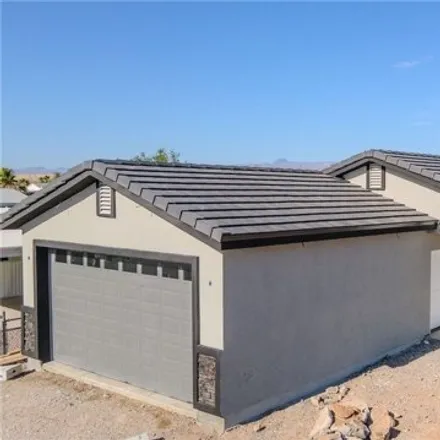 Buy this 3 bed house on 1478 Verde Dr in Bullhead City, Arizona
