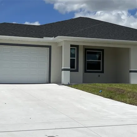 Rent this 2 bed duplex on 2427 Paul Avenue in Lehigh Acres, FL 33973