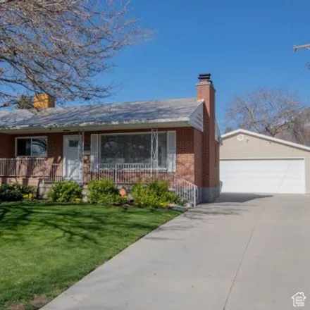 Buy this 5 bed house on 4315 Albright Drive in Holladay, UT 84124