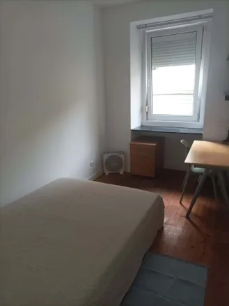 Rent this 2 bed room on Calçada de Arroios in 1000-060 Lisbon, Portugal