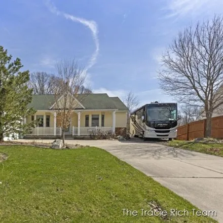 Buy this 4 bed house on 134 Glencarin Drive Northeast in Rockford, MI 49341
